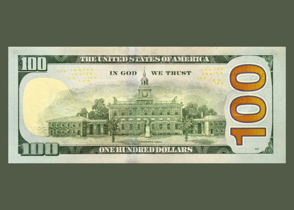 напис in god we trust на зворотній стороні долара
